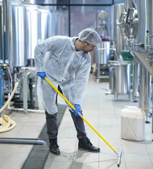 Mopping a restaurant kitchen floor